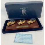 Boxed Lledo 24 carat gold plated limited edition 3 vehicle set on wooden plinth, #RPL 1003. Complete