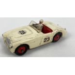 A1950's Dinky Toys diecast #109 Austin-Healey (competition) in cream & red with No. 23 decals and