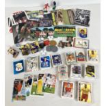 A box of assorted vintage football trading cards, stickers & collectables. To include: Panini