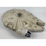 A 1979 vintage Star Wars Millennium Falcon by Kenner. In play worn condition with age related