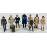 A collection of 9 vintage 1980 "The Empire Strikes Back" Star Wars action figures. Comprising: