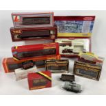 A collection of boxed and unboxed OO gauge railway coaches and wagons together with 2 boxed Lledo