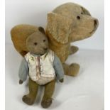 2 vintage blond haired, straw filled soft toys; a teddy bear together with a large dog.