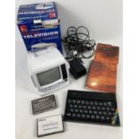 A vintage 1980's Sinclair ZX Spectrum 16K with programming books, adapter and Beyond Horizons