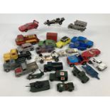 A box of assorted vintage Corgi diecast vehicles, in play worn condition. To include: Whizzwheels,