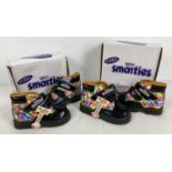 2 boxed pairs of 1997 Nestle Smarties licensed toddler boots, size 7. In black patent finish with