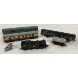 A Hornby OO gauge British Railways Locomotive 69567 in black together with 3 coaches and a Esso