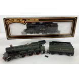 A boxed Mainline Railways N2 Class 0-6-2 Tank Locomotive with LNER black livery. Together with a