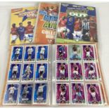 4 card binders containing a quantity of assorted football trading cards (not complete).