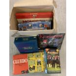 A collection of vintage board games to include: Trivial Pursuit, Cluedo, Kensington and Monopoly.