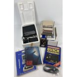 A vintage 1980's Sinclair ZX 81 home computer with programming book, power pack, leads, Mirrorsoft