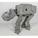 A vintage 1981 "Empire Strikes Back" AT-AT Walker by Kenner, incomplete. Total height approx. 45cm.