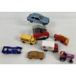 A small collection of assorted vintage diecast vehicles together with an Ertl Wrist Racers Knight