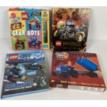 2 x DK Lego books with play pieces together with a Lego Gear Bots construction set and boxed Click