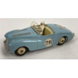 A 1950's Dinky Toys #107 Sunbeam Alpine (competition) in pale blue with No. 26 decals and driver.