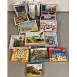 16 assorted puzzles of varying sizes and designs, some sealed, to include examples by