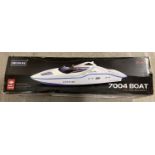 A boxed Shuang Ma Radio Control 7004 Racing Boat. Complete with boat stand, battery pack, remote