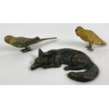 2 hand painted lead bird figures, a Budgerigar and a Canary, together with a brass sleeping fox