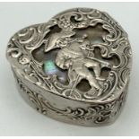 A continental 800 silver heart shaped pill/trinket box with classic figure and scroll decoration