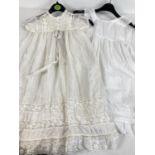 A vintage silk and lace christening gown with cotton under slip with embroidery detail to hem.