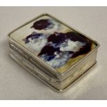 A small silver pill box with ceramic plaque set to hinged lid, depicting kittens. Stamped 925