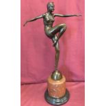 A large Art Deco style bronze figurine mounted on circular marble plinth. Signature and foundry