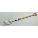 A Victorian white metal and ivory handled large fork in the form of a garden fork. Possibly a