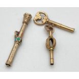 An Edwardian yellow metal miniature extending propelling pencil. Set with turquoise cabochons (one