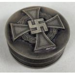 A reproduction German WWII style wooden snuff pot with metal panel detail to lid and base. Approx.