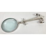 A magnifying glass with novelty shaped handle in the form of an anchor. Approx. 29.5cm long, glass