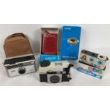 2 vintage Kodak cameras together with a boxed Solid State Satellite transistor radio. Model 010,