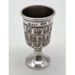 An Edwardian silver thimble (size 15) modelled in the form of a goblet. Hallmarked Birmingham