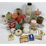 A collection of vintage vanity powder puffs, powder bottles and vanity jars. Lot also includes