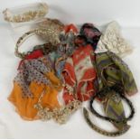 A collection of vintage silk, chiffon and cotton handkerchiefs and scarves together with vintage