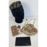 A small collection of vintage accessories. To include an evening bag with enamel flower, stone and