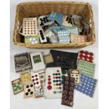 A large collection of vintage buttons in varying sizes and patterns. Most still on original cards,