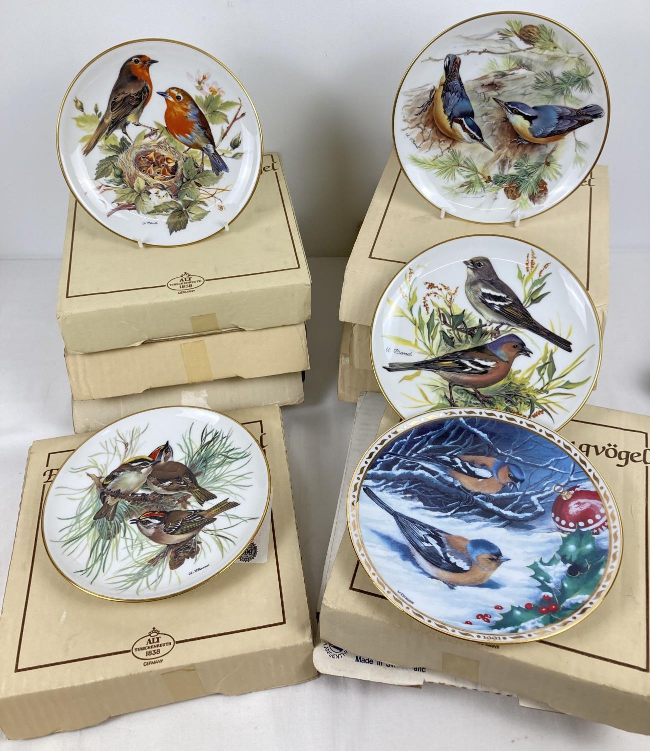 A collection of 8 Bradford Exchange Bradex Alt Tirschenreuth WWF bird plates. All numbered and in