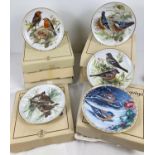 A collection of 8 Bradford Exchange Bradex Alt Tirschenreuth WWF bird plates. All numbered and in