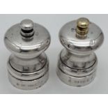 A pair of 925 silver Peter Piper salt & pepper mills. Each fully hallmarked for London 2000, with