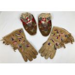 A pair of vintage handmade Inuit deerskin leather gloves and moccasin style slippers/shoes with hand