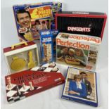 A box of assorted vintage and more modern board games & puzzles. To include: A vintage Fisher