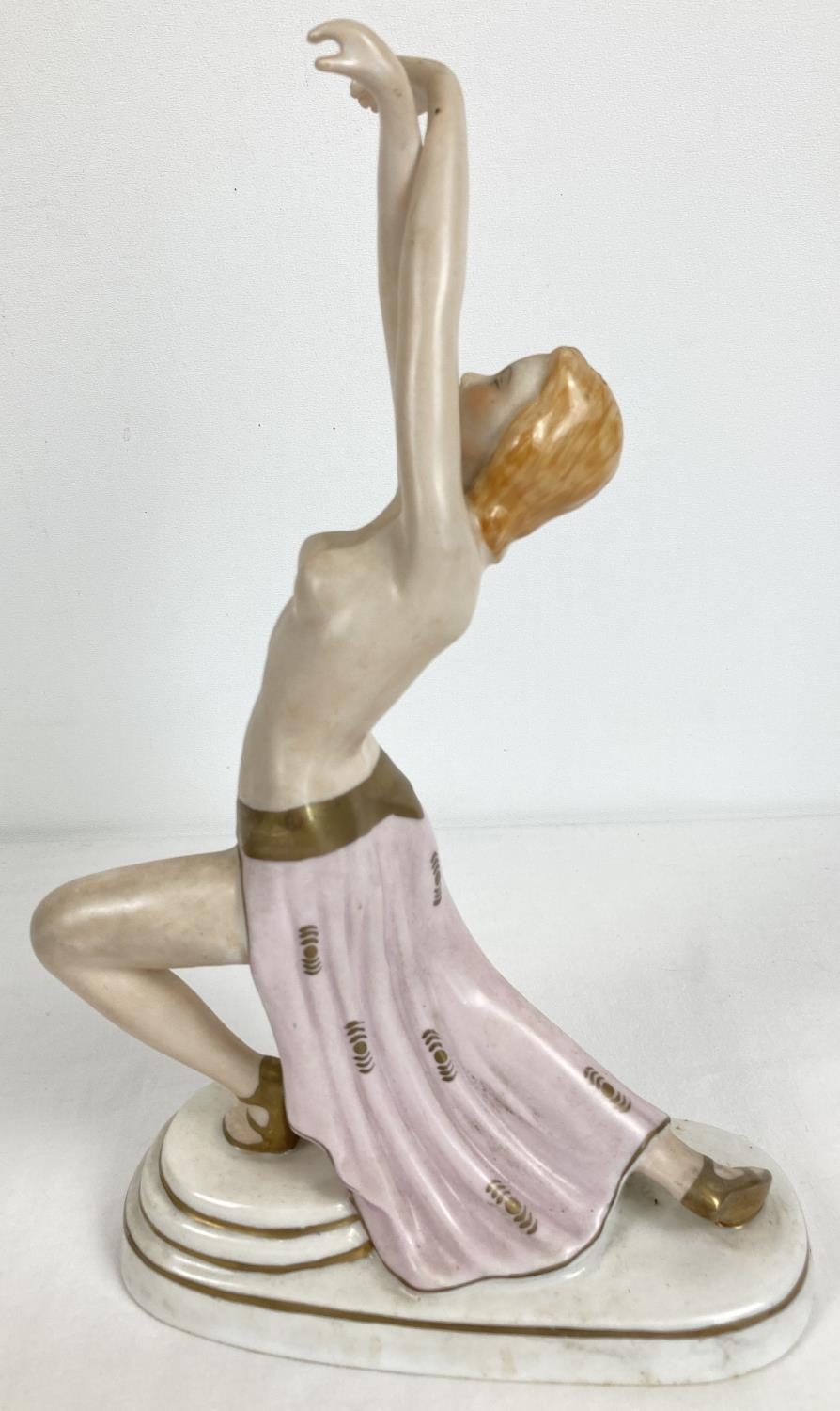 An Austrian Wien porcelain semi nude figurine of a dancer in an Art Deco style. With gilt detailing. - Image 2 of 3