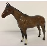 Beswick ceramic horse figurine "Imperial", in brown gloss colourway. Model #1557. Designed by Albert