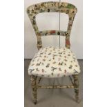 A vintage wooden balloon back chair with Disney Mickey Mouse decoupage decoration. Seat