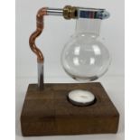 A modern rustic effect tea light oil burner made from a glass round bottom scientific flask. Approx.