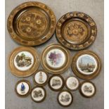 A collection of assorted vintage wooden framed ceramic plaques, in varying sizes. Together with 2