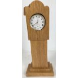 A vintage handmade wooden watch stand in the shape of a long cased clock. Together with a vintage