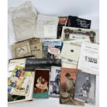 A box of assorted vintage and antique ephemera. To include: ration books, antique hand writtten