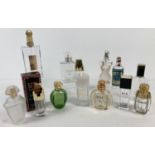 13 empty perfume bottles. To include: Channel No. 5, Dune by Christian Dior, Ysatis by Givenchy,