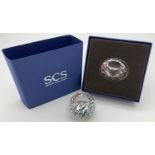 2 Swarovski Crystal Society pieces. A boxed 2012 diamond renewal piece together with an unboxed